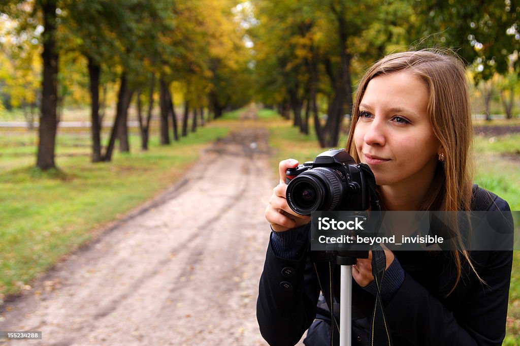 woman the photographer on the nature